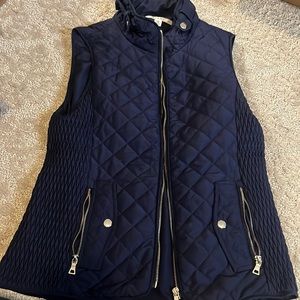 Navy blue quilted vest